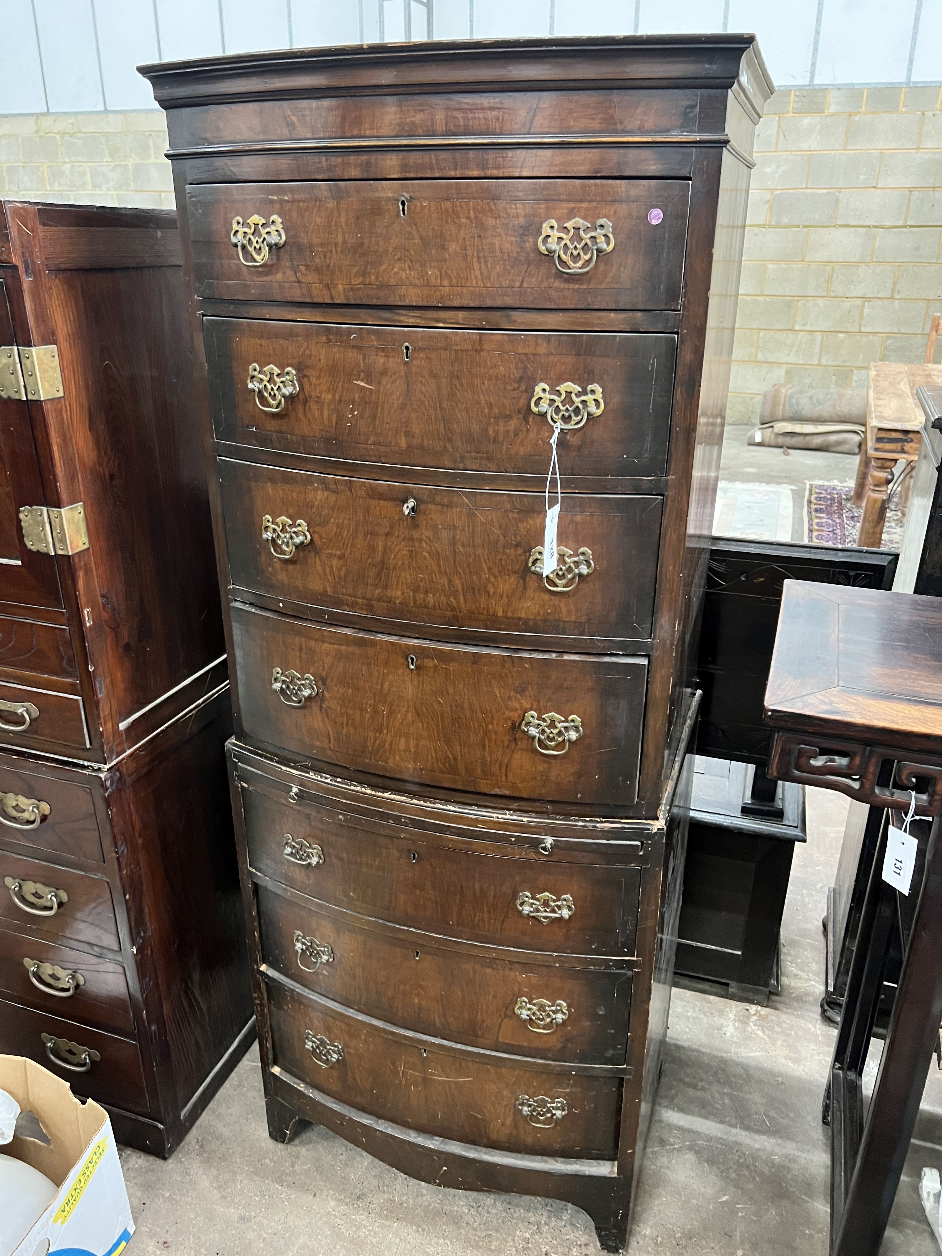 A narrow Queen Anne revival walnut bowfront tallboy, width 60cm, depth 40cm, height 157cm
